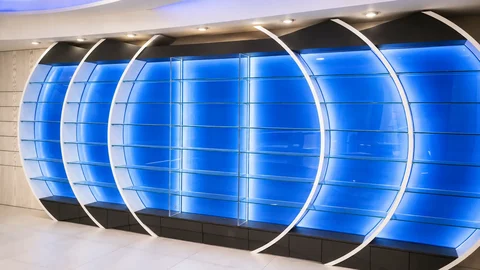 Farmacia OASI — Parete espositiva retroilluminata